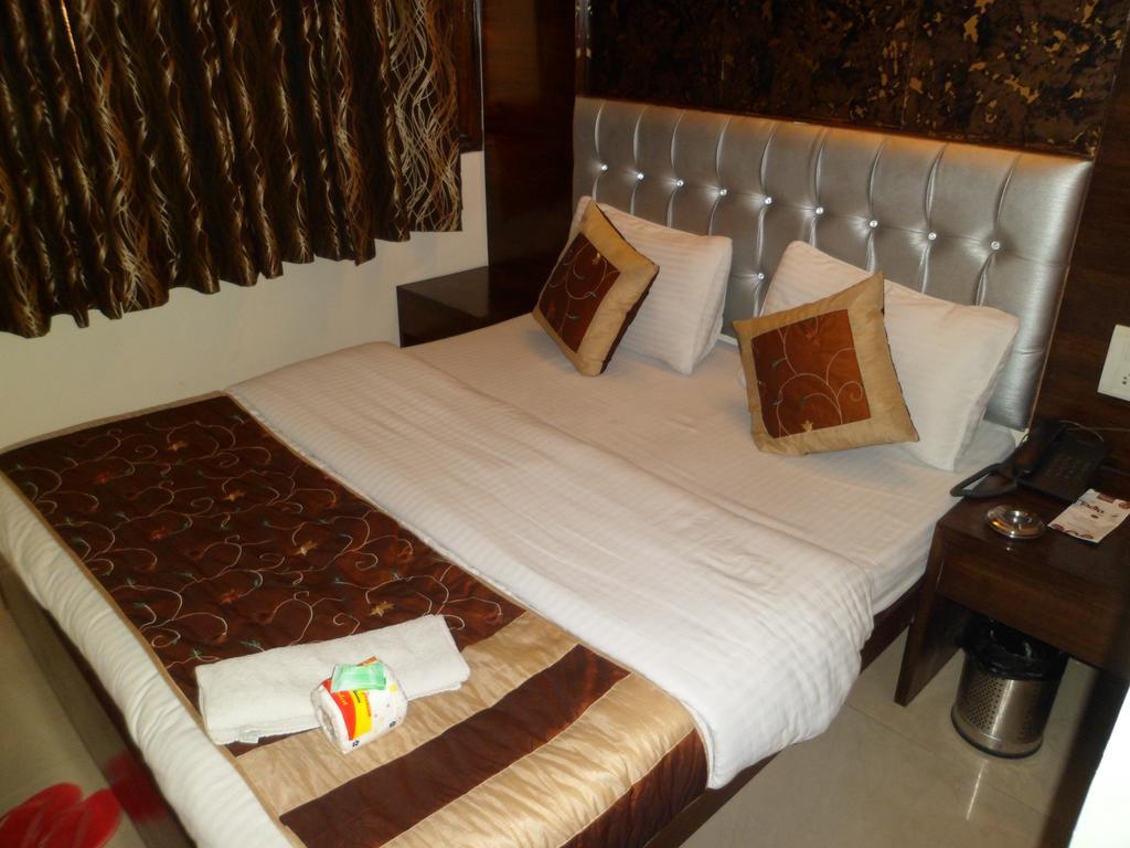 Hotel Arjun New Delhi Værelse billede